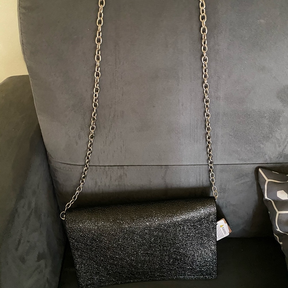 Black clutch / cross body bag with silver chain